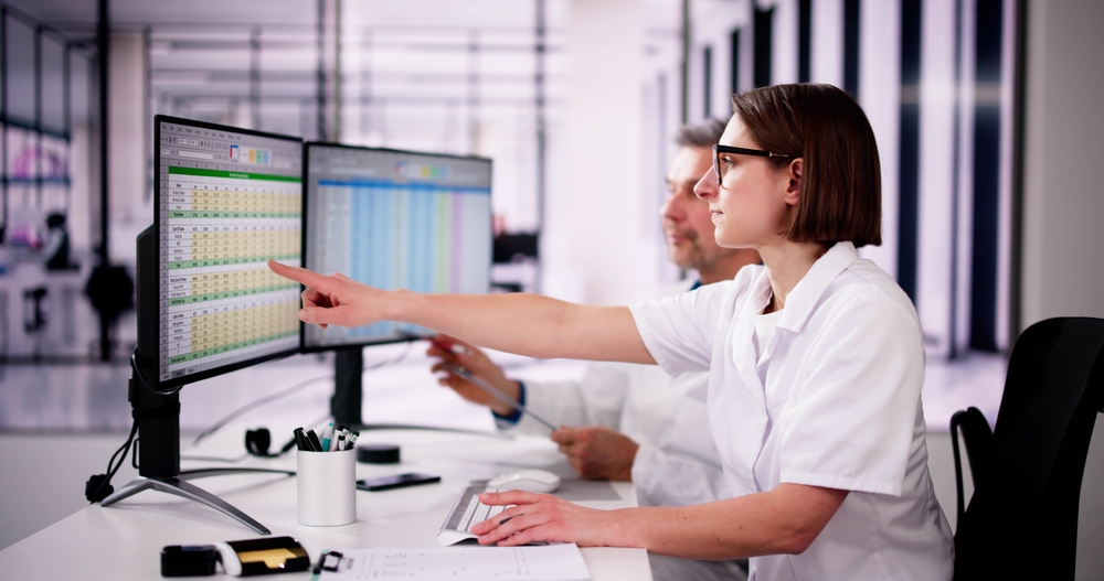 Hospital,Doctor,Using,Spreadsheet,For,Billing,Codes,On,Desktop wallpaper, medical billing